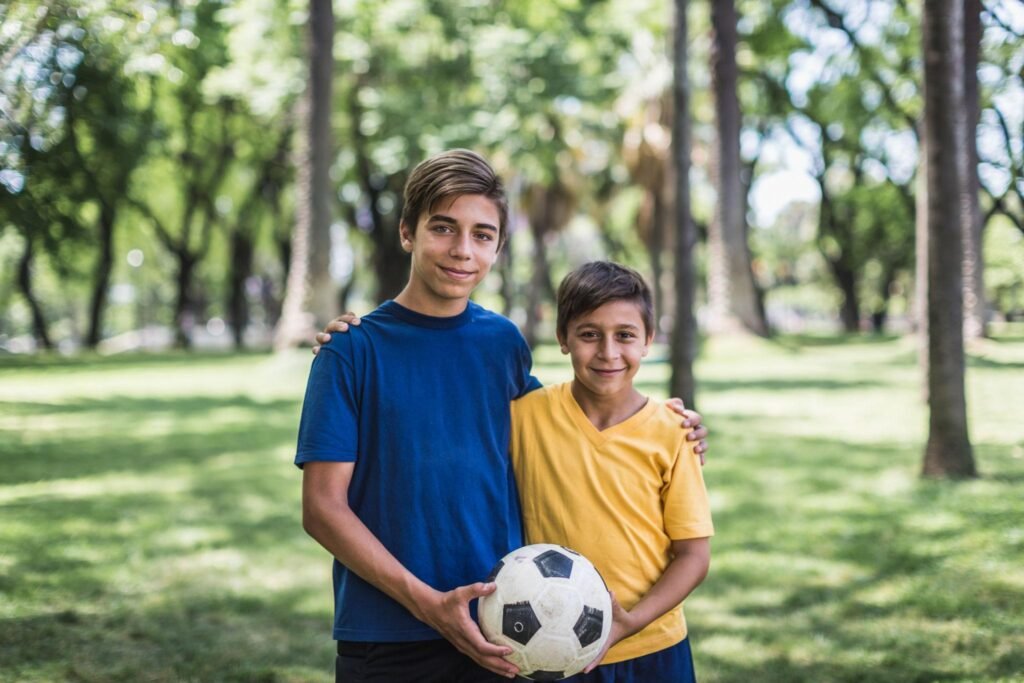 Pedri with his older brother Fernando playing football together as children